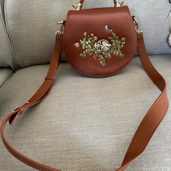 Fable England Handbags - Embroidered Brown Saddle Crossbody Bag with Floral Accent